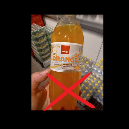 COOp Orange light sodavand  indeholder Aspartam